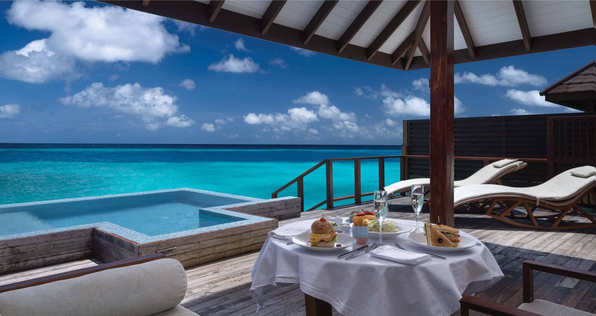 Experience the ultimate luxury with panoramic ocean views from our water pool villas in the Maldives, where your private cocoon features unrivaled tranquility.